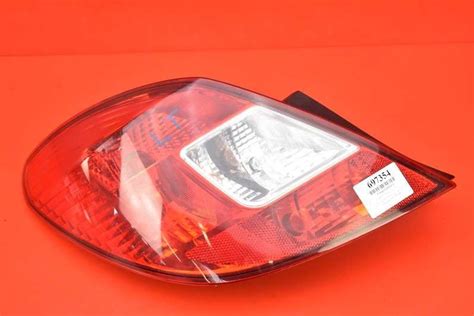 LAMPA LEWA TYŁ TYLNA OPEL CORSA D 5D LIFT 11R Shrot pl