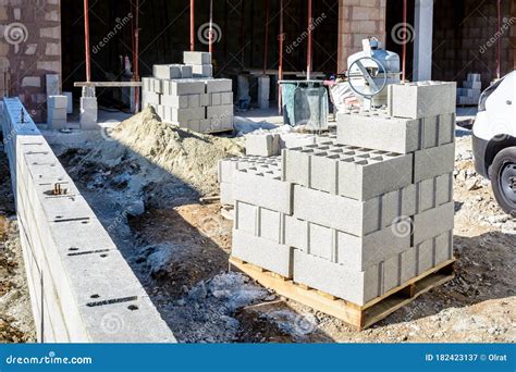 Concrete Blocks Stacked On Pallets Outdoors On A Construction Site