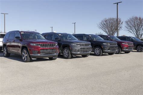 Jeep Grand Cherokee SUV Display at a Stellantis Jeep Dealership. the ...