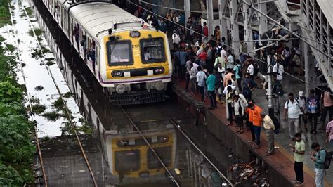 Mumbai Rains Live Updates Mumbai Rains Hit Local Train And Flight