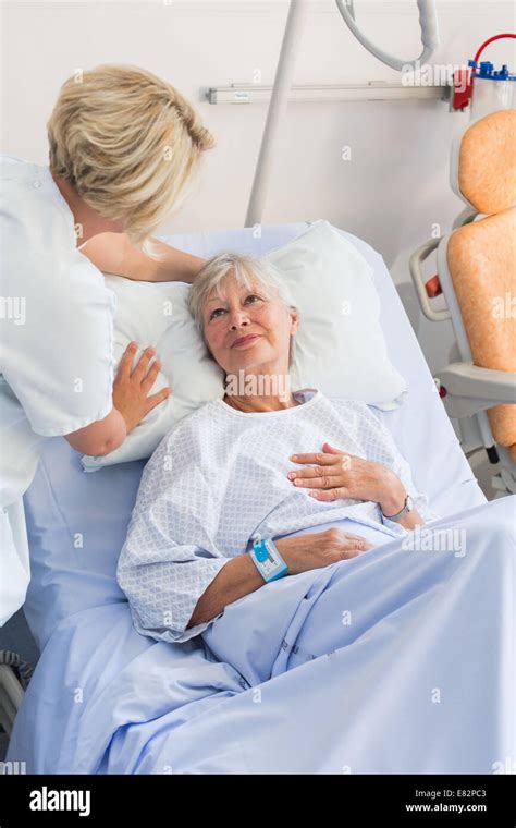 Auxiliary Nurse And Patient Stock Photo Alamy