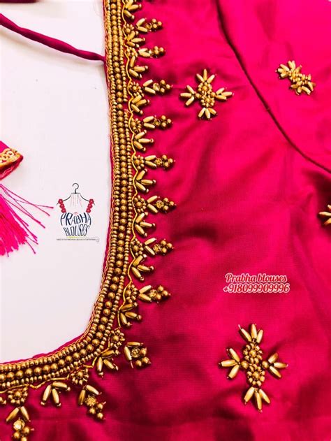 An Embroidered Blouse With Tassels And Beads On The Collar Along With