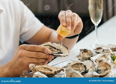 Oyster Man Eating Shellfish Seafood And Mediterranean Cuisine With