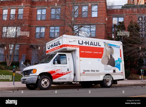 Uhaul Moving Truck Parked In Front Of Apartment Building Stock Photo