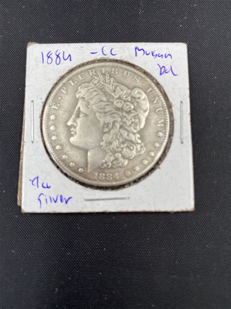 1884 MORGAN SILVER DOLLAR "CC"