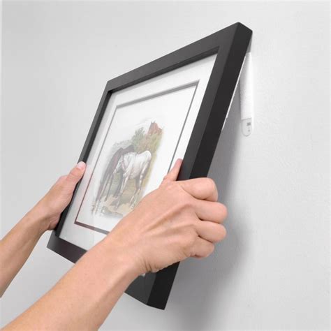 How to Hang Pictures Without Nails | Family Handyman