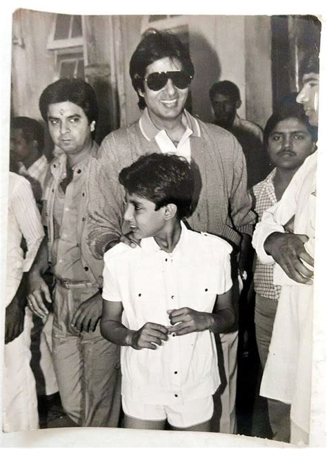 Amitabh Bachchan with his son Abhishek Bachchan and Producer Romesh ...