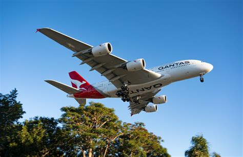 Qantas Returns To Melbourne Singapore By World Traveler Club