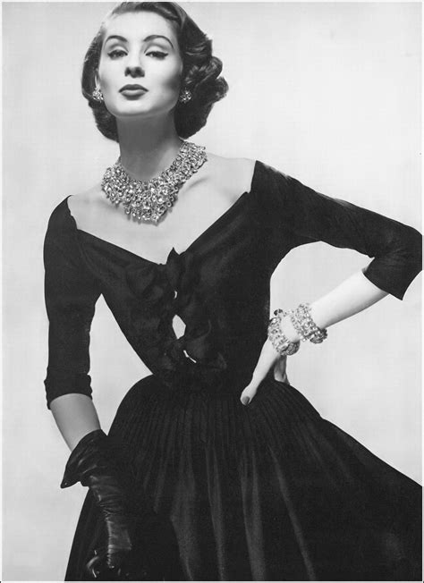 Suzy Parker In Dress Of Black Silk Peau De Ange With Bows Tied Across