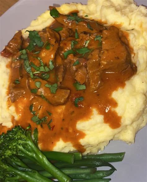 Slow Cooker Beef Stew Recipe With Red Wine Slow Cooked Beef Stew Served On A Bed Of Creamy Mash