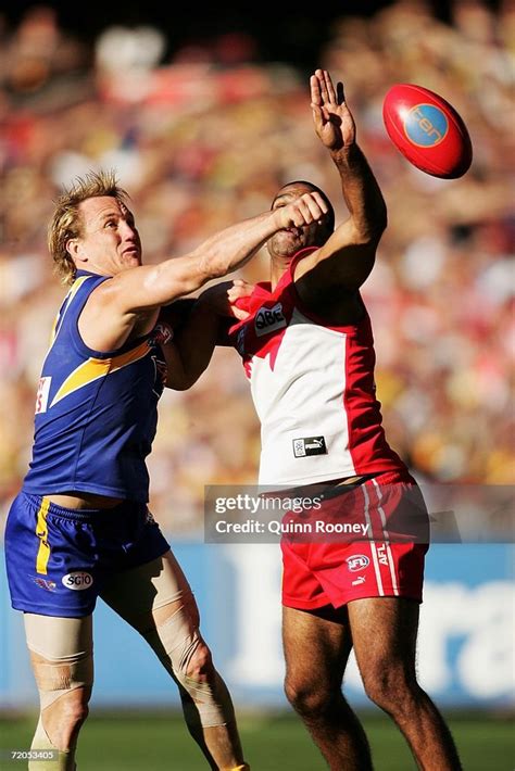 Daniel Chick Of The Eagles And Michael Oloughlin Of The Swans Fight