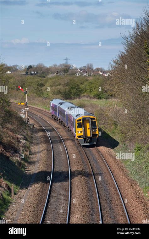 Northern Rail Class 158 Train 158755 Passing Poulton Le Fylde With Semaphore Home And Distant