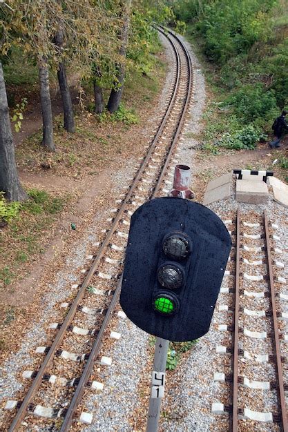 Premium Photo Railroad And Semaphore With Green Signal