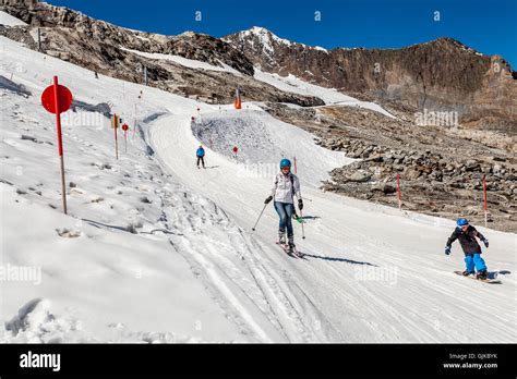 View Of A Ski Track With People Skiing In A Summer Day At Hintertux