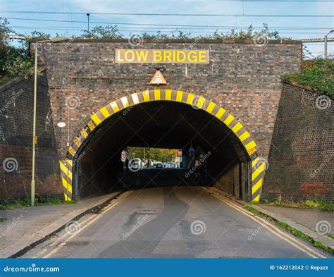 Low Bridge Height Restriction Warning Stock Photo - Image of warning ...