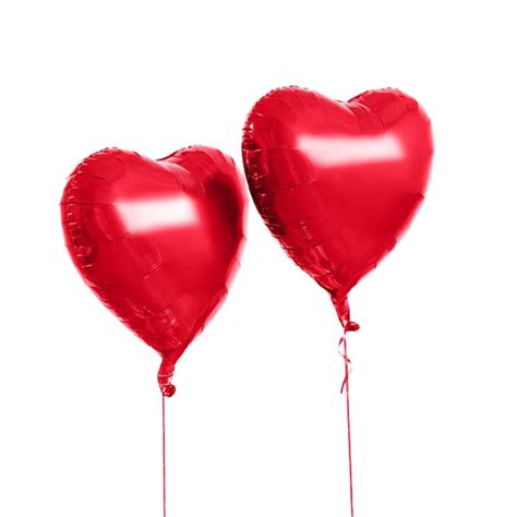 Premium Photo Two Red Heart Shaped Helium Balloons