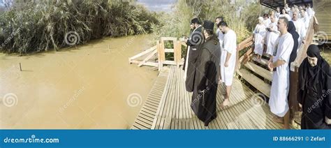 Christian Pilgrims During Mass Baptism Ceremony At The Jordan River