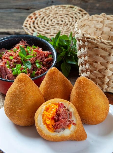 Premium Photo | Coxinha with beef jerky and cheddar cheese