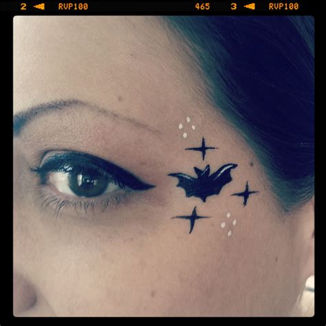 Teeny tiny bat eye design! Face painting by Glitter Goose. Paint ideas ...