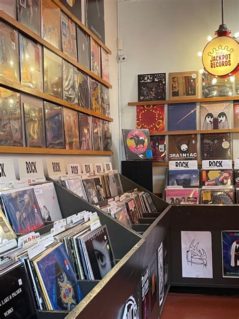 The Inside Of A Record Store With Various Records On Display