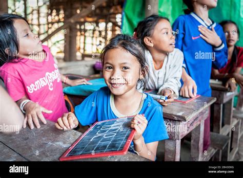 Cambodian School Children Smile For The Camera In A School In The