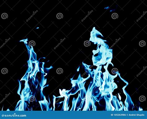 Abstract Background Of Blue Flame Fire On Black Background Stock Photo