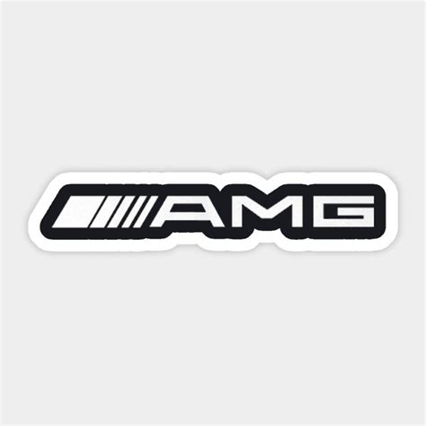 The Amg Logo Sticker Is Shown In Black And White On A Gray Background