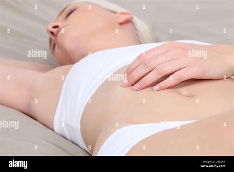 Blonde Woman Sleeping On Bed Stock Photo Alamy