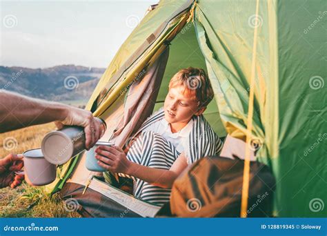 Boy Drinks A Hot Tea Sitting In The Camp Tent Stock Image Image Of