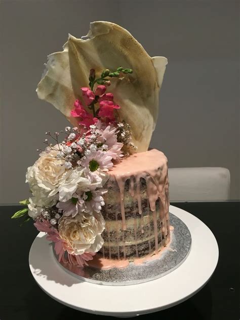 Drip Naked Cake With Fresh Flowers In Pinks And White Fresh Flower