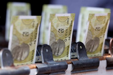 Rupee Closes Flat After Brief Dip To All Time Low Amid Rising Us Yields