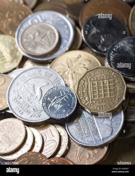 Different world coins Stock Photo - Alamy