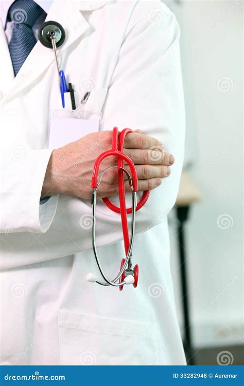 Male Doctor Holding Stethoscope Stock Photo Image Of Clinical Hear