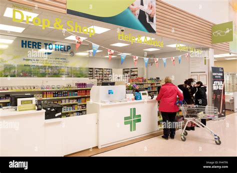 people waiting at Tesco pharmacy, Newmarket Suffolk UK Stock Photo - Alamy