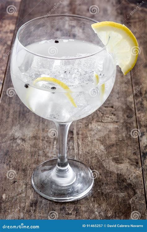 Glass Of Gin Tonic With Lemon On Wood Stock Image Image Of Glass Tonic 91465257