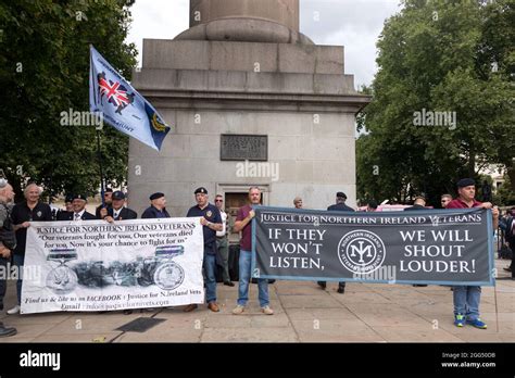 Veterans Seen Holding Banners That Say Justice For Northern Ireland