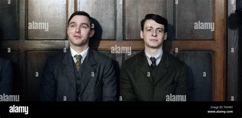 TOLKIEN, from left: Nicholas Hoult as J.R.R. Tolkien, Anthony Boyle ...