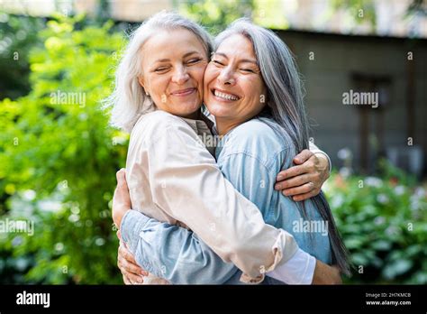 Two Women Touching Each Other Hi Res Stock Photography And Images Alamy