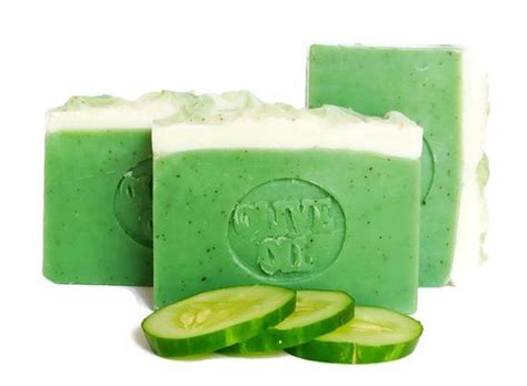 Cucumber Soap Bar And Slices Of Cucumber On White Background