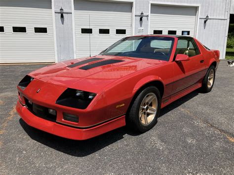 Chevrolet Camaro Z Iroc Z Is A Red And Gold Teenage Dirtbag