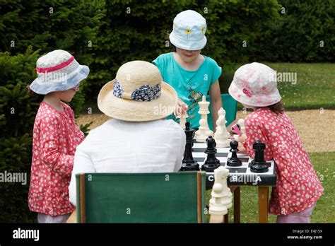 Outdoor chess played on the South Lawn of Hughenden Manor during a Victorian Weekend Event Stock ...