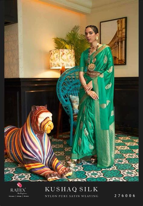 Rajtex Kushaq Silk Occasion Wear Nylon Satin Silk Saree Supplier In Surat