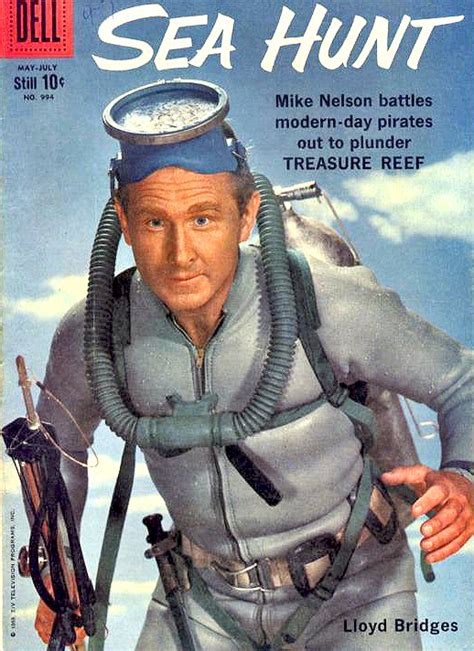 An Old Magazine Cover With A Man In Diving Gear