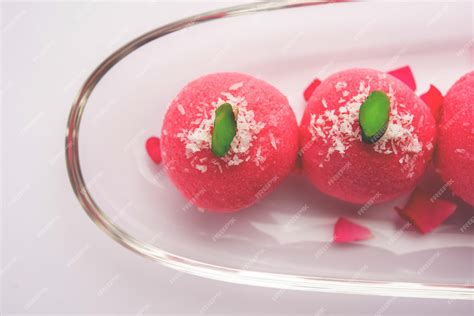 Premium Photo Delicious Pink Chumchum Or Rose Flavour Cham Cham Or Rasgulla Or Rasagola