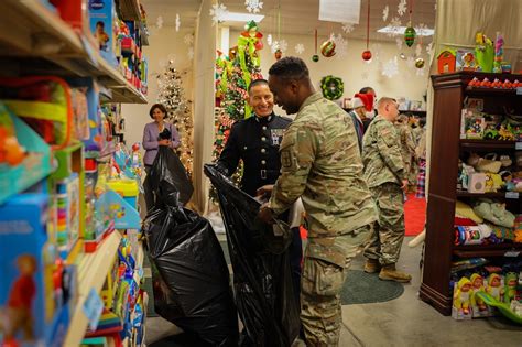 Retired Lt Gen Arthur Gregg Among Guests At Holiday Helper Open House