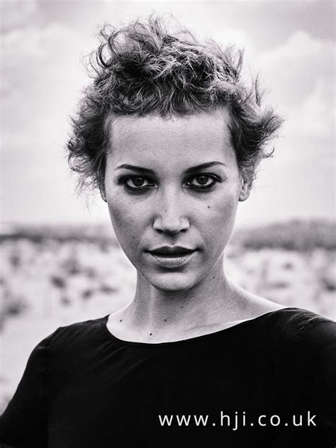 Curly Textured Pixie Crop With Blonde Highlights