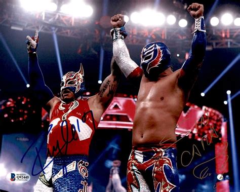 Wwe Rey Mysterio And Sin Cara Tag Team