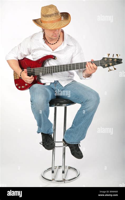 Playing Guitar Sitting On Stool Hi Res Stock Photography And Images Alamy