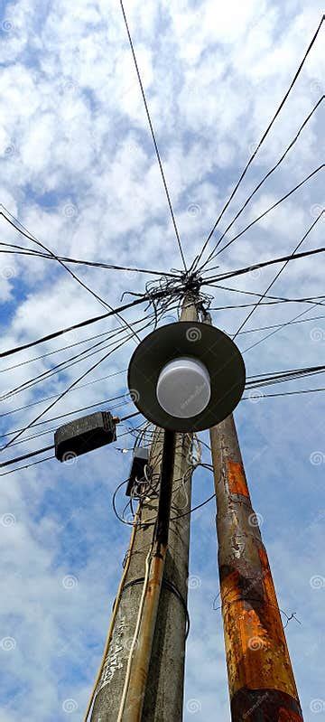 Power Poles And Telephone Poles Adjoining The Many Wires Stock Image