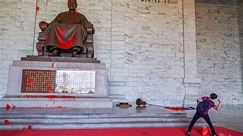 Formosan Independence Activists Splatter Statue Of Chiang Kai Shek In